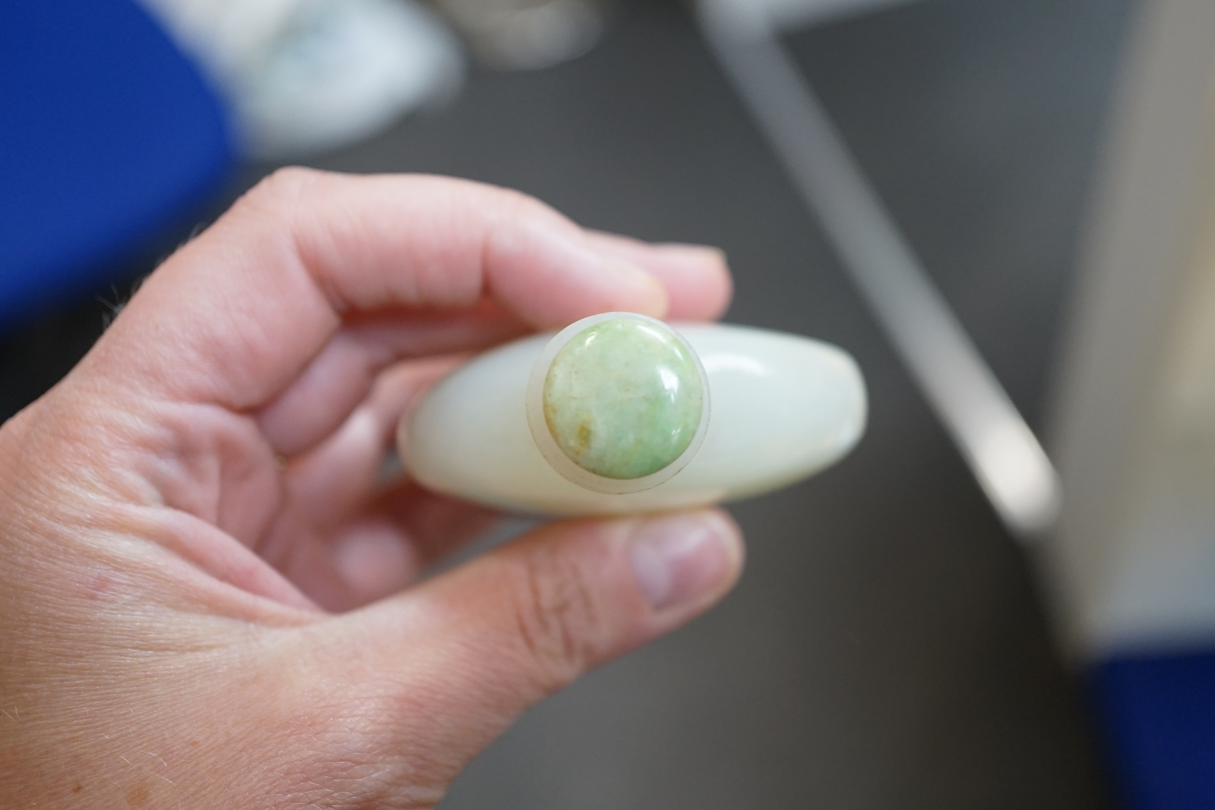 A Chinese pale celadon jade snuff bottle, of moonflask form, 19th century